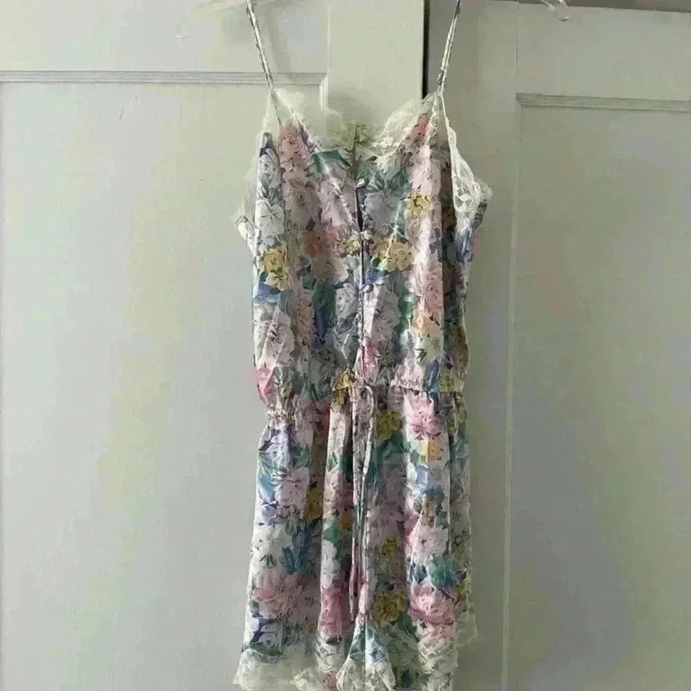 Gold Label Victoria Secret blue/pink floral romper with lace detail; size S